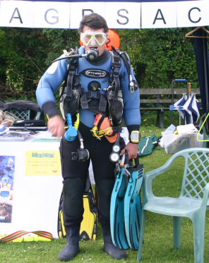 A fully equipped diver, all that is missing is somewhere to dive.