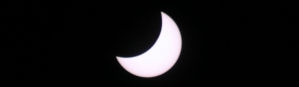 The Moon begins to cover the Sun